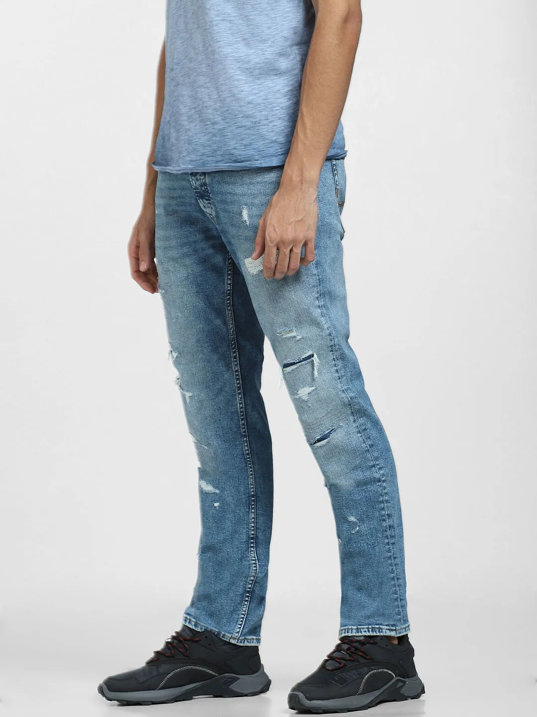 Light Blue Low Rise Distressed Tim Slim Fit Jeans