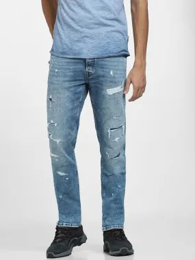 Light Blue Low Rise Distressed Tim Slim Fit Jeans