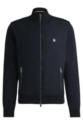 Mixed-material zip-up jacket with double-monogram badge