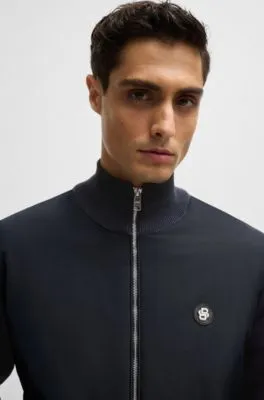 Mixed-material zip-up jacket with double-monogram badge