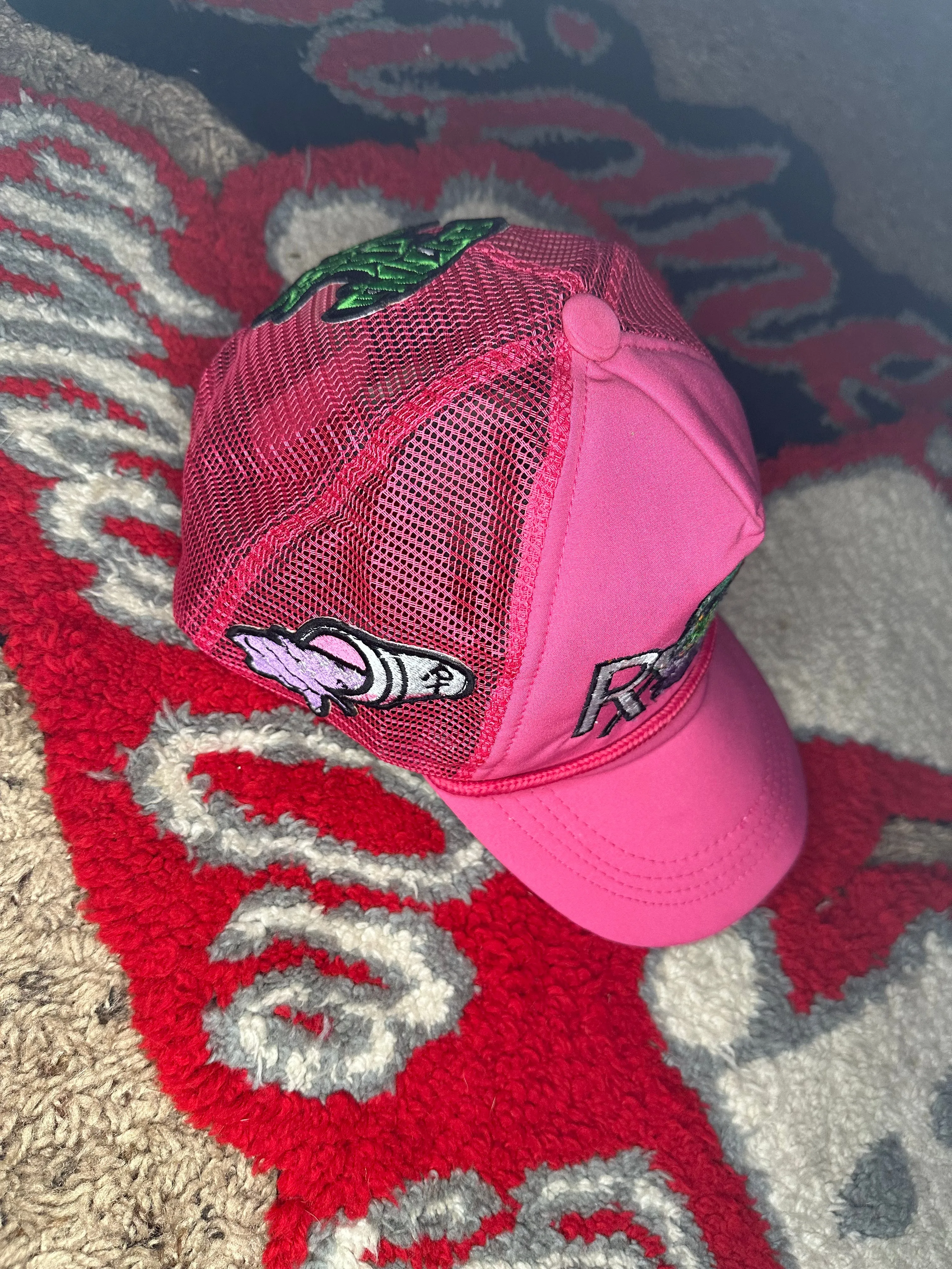 PRETTY PINK SLATTBIDNEZAPPAREL TRUCKERS HAT