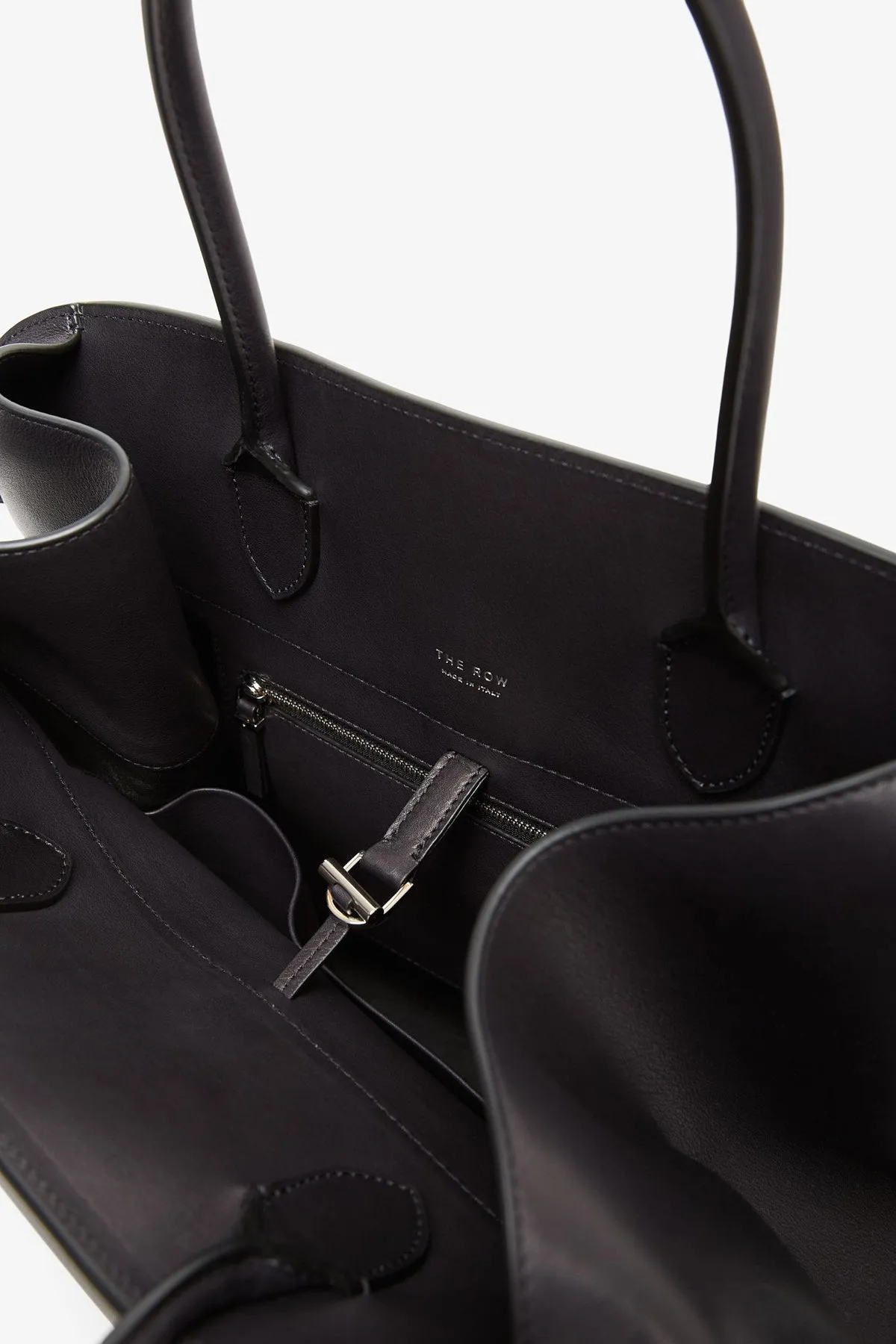 The Row Margaux 17 black saddle leather bag