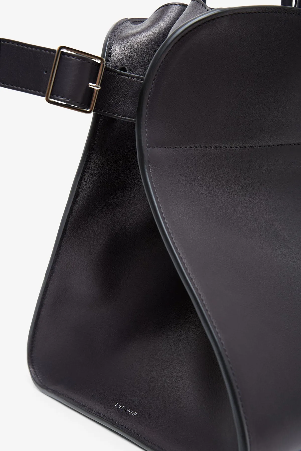 The Row Margaux 17 black saddle leather bag